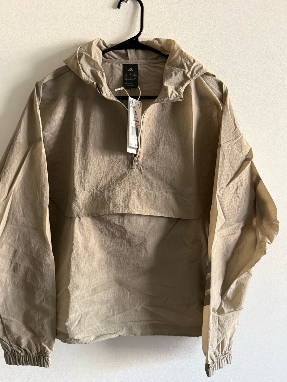 Adidas women’s beige multi sport jacket